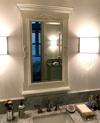 Photo of trumeau mirror over a batrhroom vanity made by Rick Samson.